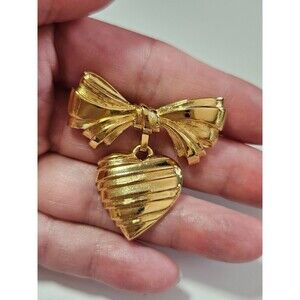 **Sale** Avon gold tone bow with heart brooch
